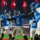 Ole Miss players celebrate a touchdown with Kewan Lacy against South Carolina.