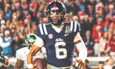 Ole Miss Rebels quarterback Trinidad Chambliss carries the ball against the Tulane Green Wave