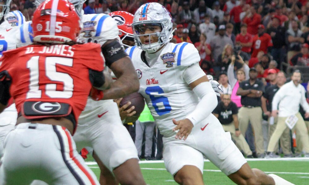 Ole Miss Rebels quarterback Trinidad Chambliss runs against the Georgia Bulldogs