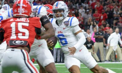 Ole Miss Rebels quarterback Trinidad Chambliss runs against the Georgia Bulldogs