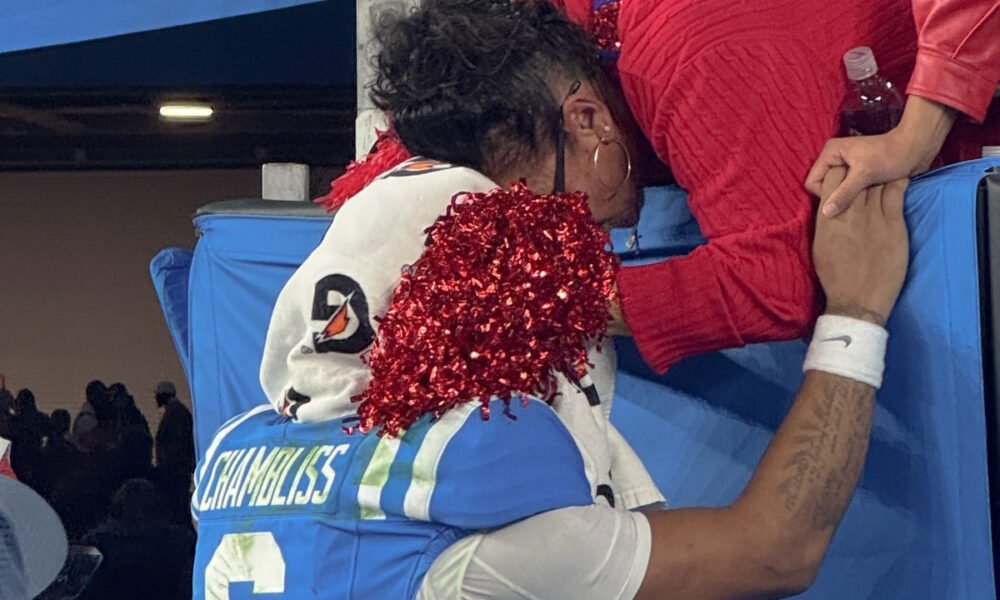 Ole Miss Rebels quarterback Trinidad Chambliss with his mother after a loss to the Miami Hurricanes