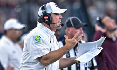 Former Texas A&M Aggies coach Jimbo Fisher on the sidelines in a game at AT&T Stadium