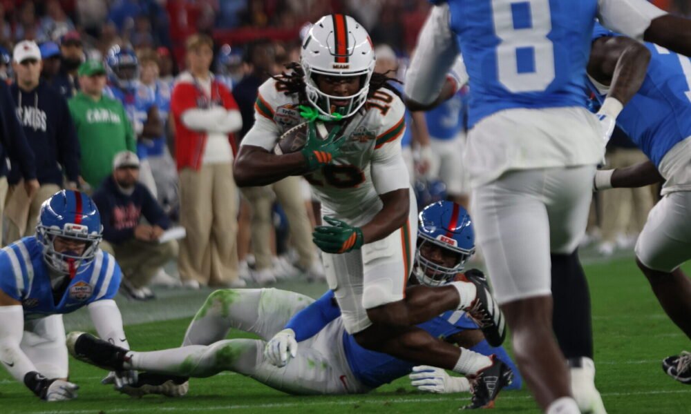 Miami running back Mark Fletcher Jr. runs down field against Ole Miss in a CFP semifinal game. | Ole Miss Athletics