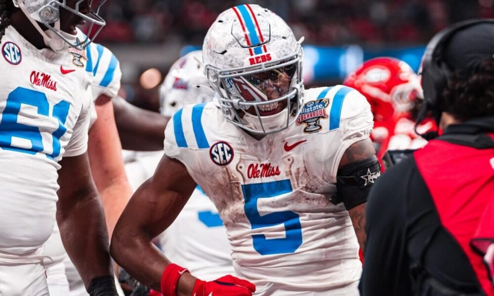 Ole Miss running back Kewan Lacy celebrates a touchdown in the CFP quarterfinal game against Georgia. | Ole Miss Athletics