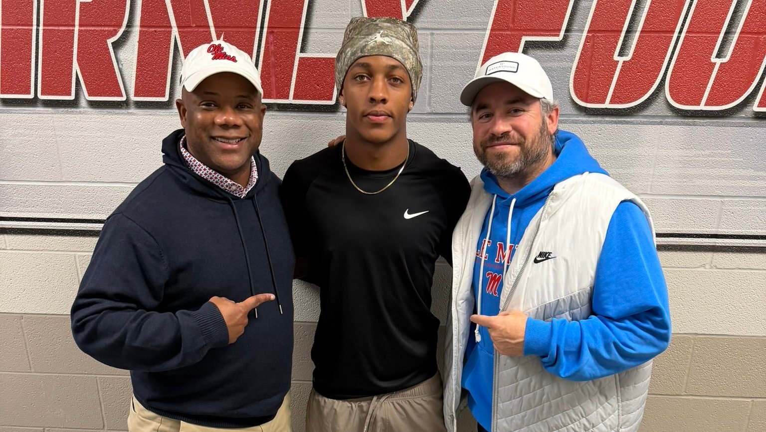 Ole Miss running backs coach Frank Wilson, left, Ruston safety Jayden Anding and Ole Miss head coach Pete Golding on Friday in Louisiana. | Photo Credit: Jayden Anding/X