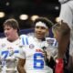 Ole Miss quarterback Trinidad Chambliss talks in the post-game celebration after winning a CFP quarterfinal game. | Ole Miss Athletics