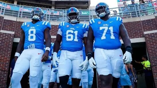Ole Miss offensive lineman PJ Wilkins, right, will be entering the transfer portal. | Ole Miss Athletics