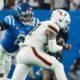 Ole Miss linebacker TJ Dottery makes a tackle during the CFP semifinal game against Miami. | Ole Miss Athletics