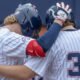 Ole Miss Rebels Daniel Pacella with teammates after hitting homer
