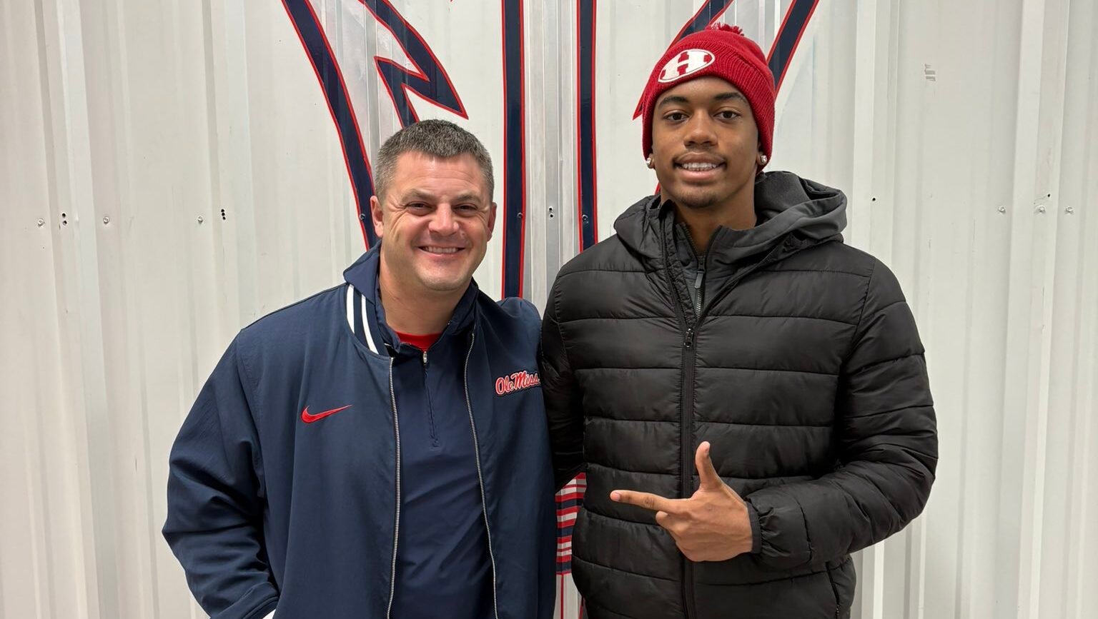 Ole Miss assistant head coach Jake Schoonover and Halls safety Jarrell Chander. | Jarrell Chandler/X