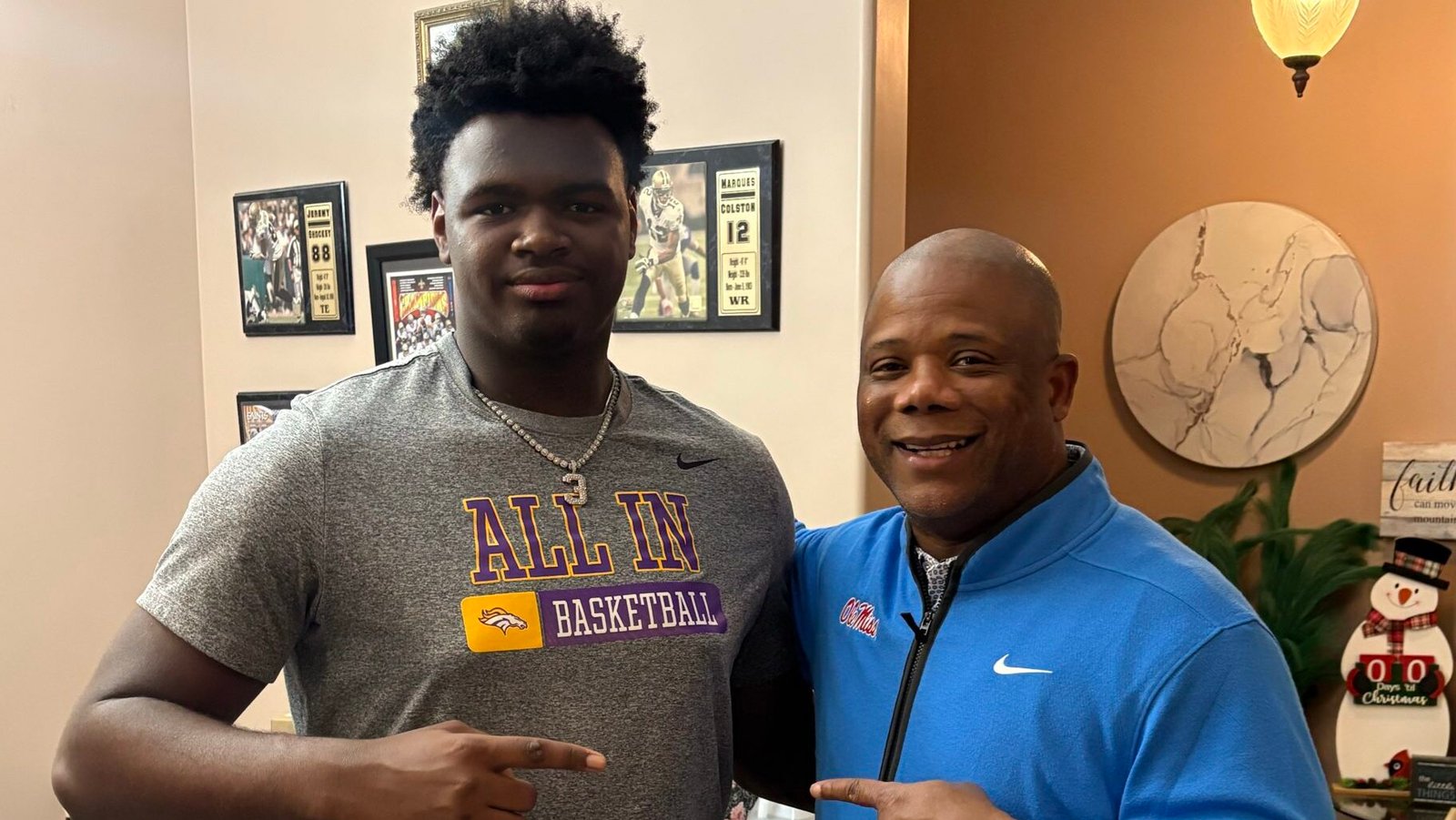 Sam Houston (La.) lineman Albert Simien with Ole Miss coach Frank Wilson. | Photo Credit: Albert Simien/X