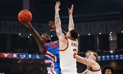 Ole Miss guard AJ Storr is fouled on a layup attempt against Texas on Saturday in Austin. | Ole Miss Athletics