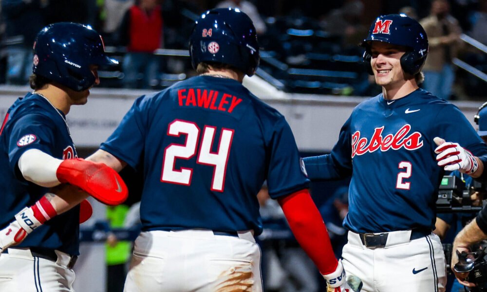 Ole Miss left fielder Brett Moseley arrives at home plate after hitting the first home run of the season for the Rebels against Nevada on Friday night. | Ole Miss Athletics