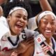 Ole Miss senior Christeen Iwuala, left, celebrates with Cotie McMahona in a post-game television interview after Monday's win against Auburn. | Ole Miss Athletics