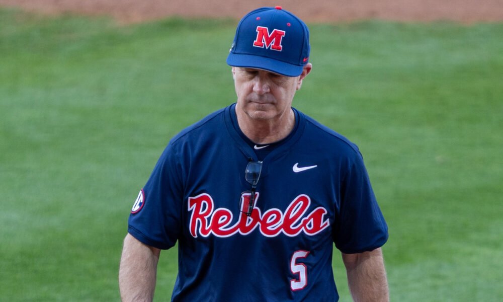 Ole Miss coach Mike Bianco walks off the field after a mound visit. | Dylan Cohron-HottyToddy.com Images