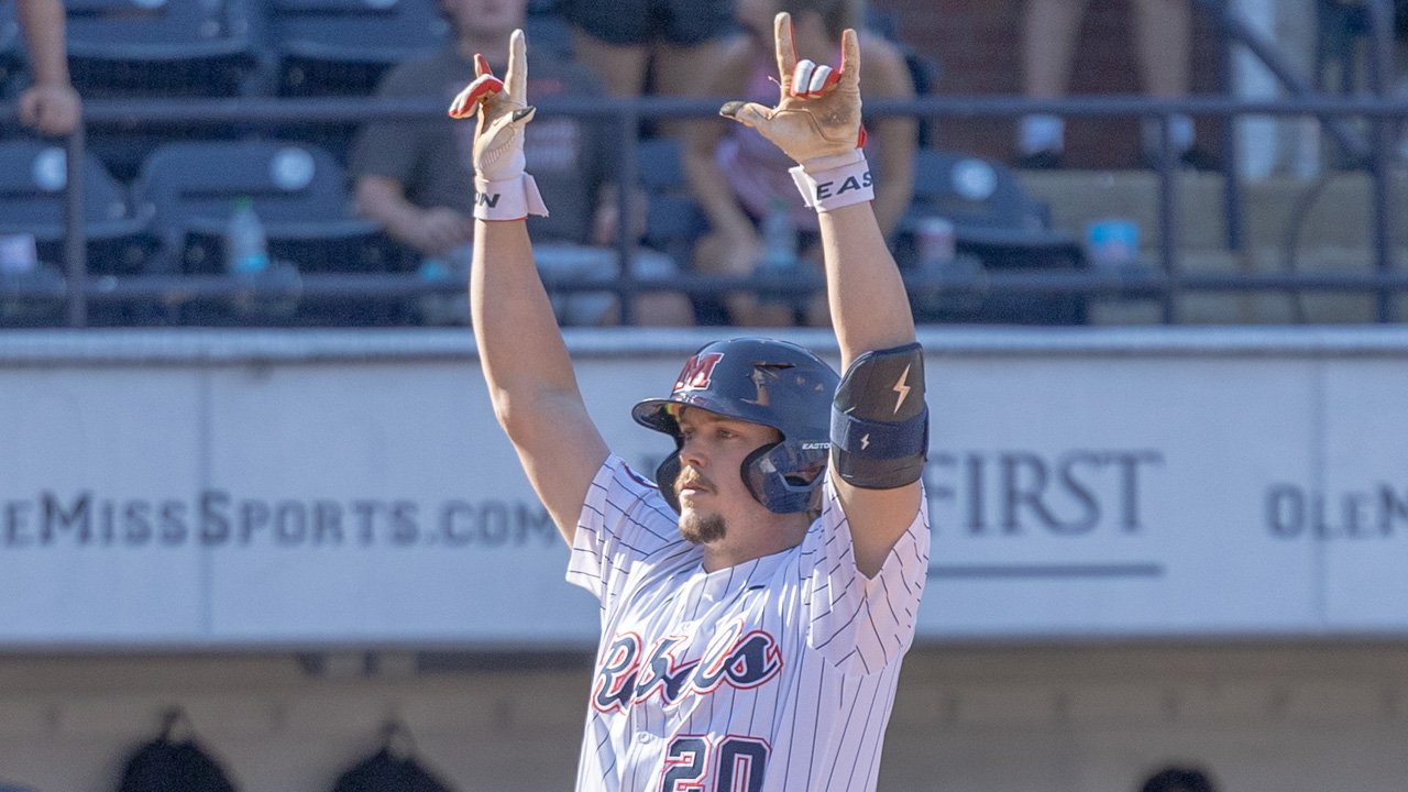 Ole Miss' Collin Reuter crosses home plate in a SEC game against Kentucky. | Dylan Cohron, HottyToddy.com Images