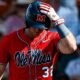 Ole Miss outfielder Tristan Bissetta walks off the field after a strikeout against No. 2 Texas in Austin. | Ole Miss Athletics