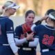 Ole Miss softball players huddle in the infield during a loss to Oklahoma in Oxford. | Ole Miss Athletics