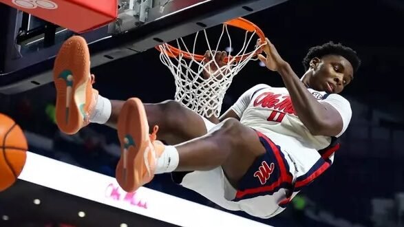 Ole Miss senior Malik Dia dunks against LSU. | Ole Miss Athletics