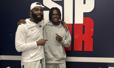 Ole Miss wide receivers coach L'Damion Washington with Lausanne Collegiate WR Lawrence Britt. Lawrence Britt/X
