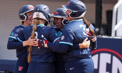 Ole Miss players celebrate Kennedy Bunker's third inning, solo home run against No. 13 Texas A&M. | Ole Miss Athletics