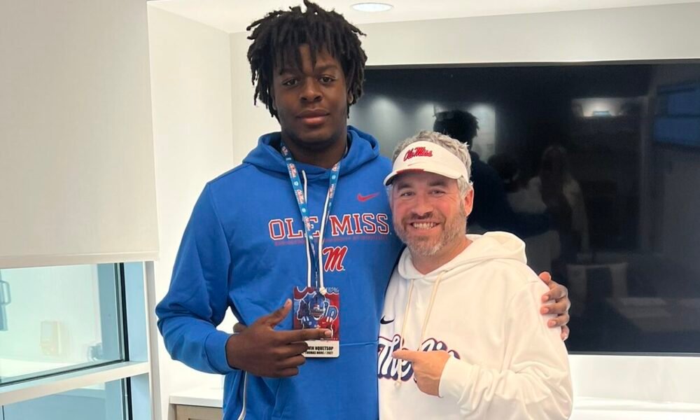 Marvin Nguetsop with Ole Miss coach Pete Golding. | Marvin Nguetsop/X