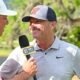 Ole Miss coach Chris Malloy talks to a television reporter after the Rebels secured a spot in the championship match. | Ole Miss Athletics