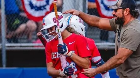 Ole Miss softball's Cassie Reasner walks off the field after scoring a run in a game against Memphis in Oxford. | Ole Miss Athletics