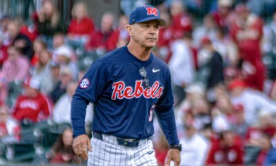 Ole Miss coach Mike Bianco walks off the field Friday at Baum Walker Stadium in Fayetteville, Ark. | Nilsen Roman-HottyToddy.com