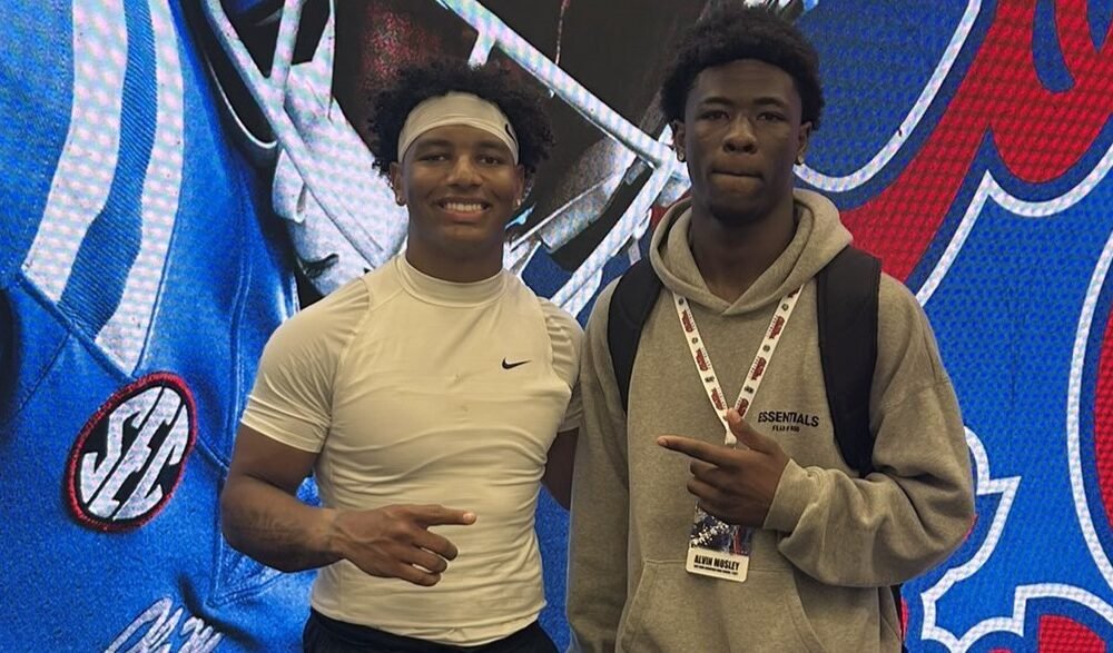 Ole Miss quarterback Trinidad Chambliss, left, with Crawford wide receiver Alvin Mosley. | Alvin Mosley/X