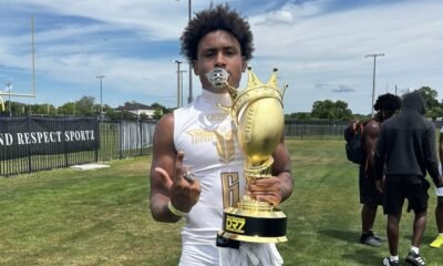Port Charlotte (Fla.) wide receiver poses with a 7-on-7 championship trophy from The Crown 2026 National Championship. | Elias Pearl/X