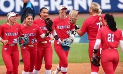 Ole Miss fielders congratulate pitcher Emilee Boyer (7) after a 2-0 win against South Carolina at the 2026 SEC Softball Tournament. | Ole Miss Athletics