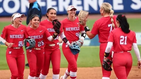 Ole Miss fielders congratulate pitcher Emilee Boyer (7) after a 2-0 win against South Carolina at the 2026 SEC Softball Tournament. | Ole Miss Athletics